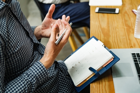 Businessmen Hands with Pen